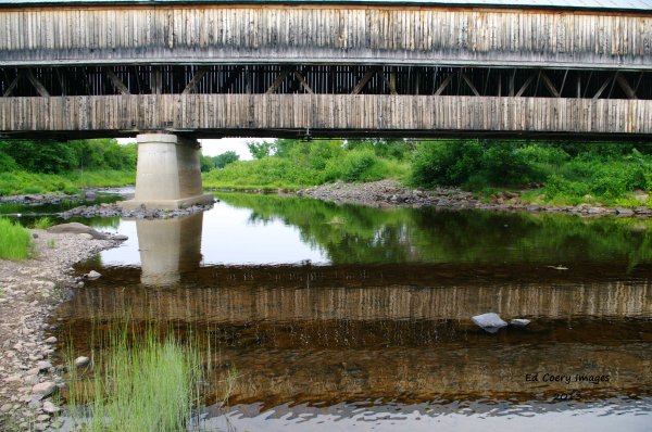 Covered Bridge Reflecting in the water